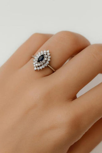 Bague 55 Bague en or blanc 750 avec saphir marquise et halo de diamants 58 Facettes 50293