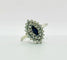 Bague 55 Bague en or blanc 750 avec saphir marquise et halo de diamants 58 Facettes 50293