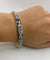 Bracelet Bracelet floral en or jaune 18 carats, argent, émeraudes et diamants 58 Facettes 50319