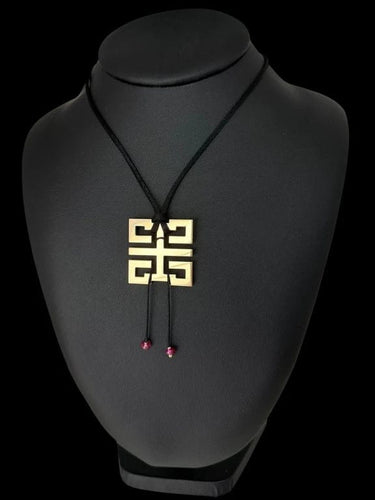 Collier Cartier Le Baiser du Dragon - Collier pendentif en or jaune 18 carats et rubis 58 Facettes