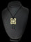 Collier Cartier Le Baiser du Dragon - Collier pendentif en or jaune 18 carats et rubis 58 Facettes