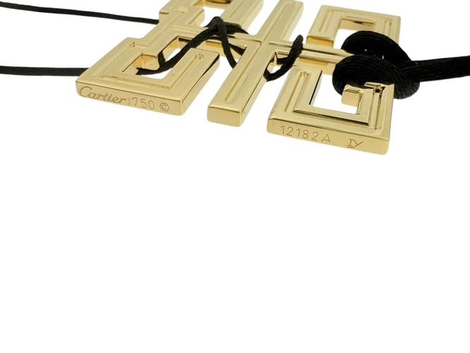 Collier Cartier Le Baiser du Dragon - Collier pendentif en or jaune 18 carats et rubis 58 Facettes