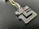 Pendentif Cartier Le Baiser du Dragon - Pendentif en or blanc 18 carats, diamants et rubis 58 Facettes