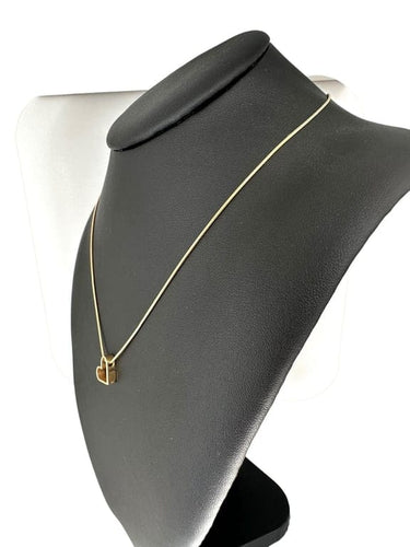 Collier UNOAERRE - Collier avec pendentif cœur en or jaune 18 carats 58 Facettes