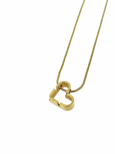 Collier UNOAERRE - Collier avec pendentif cœur en or jaune 18 carats 58 Facettes