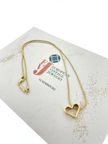 Collier UNOAERRE - Collier avec pendentif cœur en or jaune 18 carats 58 Facettes