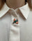 Broche Cartier - Broche oiseau en or jaune avec corail, chrysoprase et rubis 58 Facettes