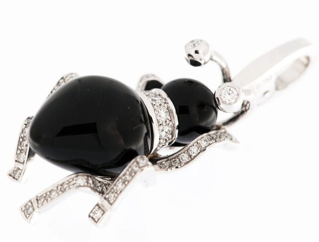 Broche Cartier - Broche La Fourmi en or blanc 18 carats, diamants et onyx 58 Facettes