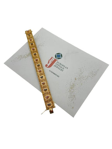 Bracelet Brevetto - Bracelet rétro en or jaune 18 carats, rubis et saphirs 58 Facettes