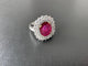 Bague 56.5 Bague cocktail en or blanc 18 carats avec diamants et rubis 58 Facettes
