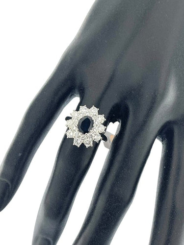 Bague 53.5 Bague en or blanc 18 carats avec saphir 1,30 ct et diamants 58 Facettes