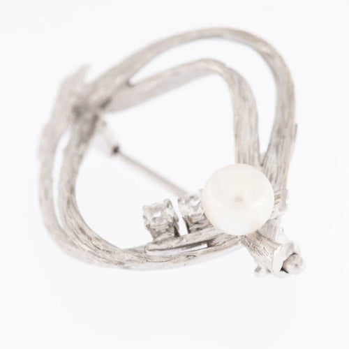 Broche Broche espagnole en or blanc 18 carats, perle et diamant 58 Facettes