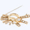 Broche Broche ancienne en or jaune 18 carats et diamants 58 Facettes