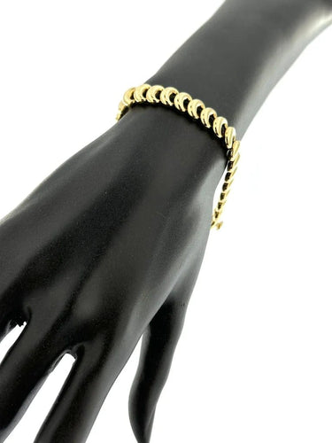 Bracelet Nanis - Bracelet souple en or jaune 18 carats 58 Facettes