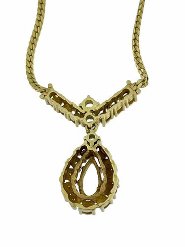 Collier Collier en or jaune et or blanc 14 carats, diamants et aigue-marine 58 Facettes