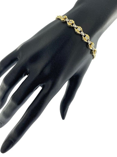 Bracelet Bracelet rétro deux ors 18 carats avec diamants 58 Facettes