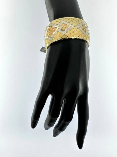 Bracelet Bracelet manchette Art déco en triple or 18 carats 58 Facettes