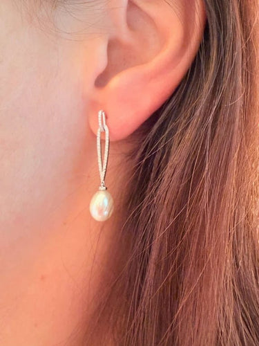 Boucles d'oreilles Boucles d'oreilles en or blanc 18 carats avec perles et diamants 58 Facettes