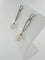Boucles d'oreilles Boucles d'oreilles en or blanc 18 carats avec perles et diamants 58 Facettes