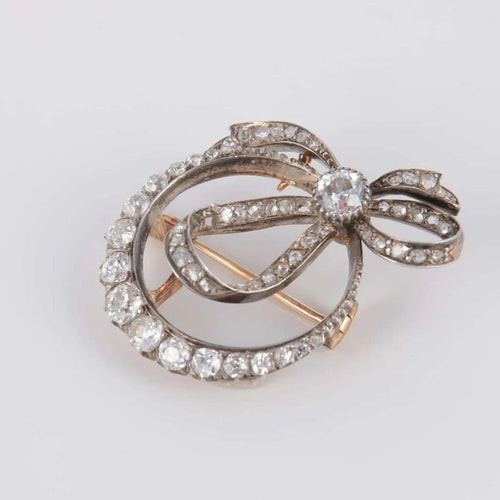 Broche Broche nœud - Diamants en or jaune et or blanc 18 ct 58 Facettes 1
