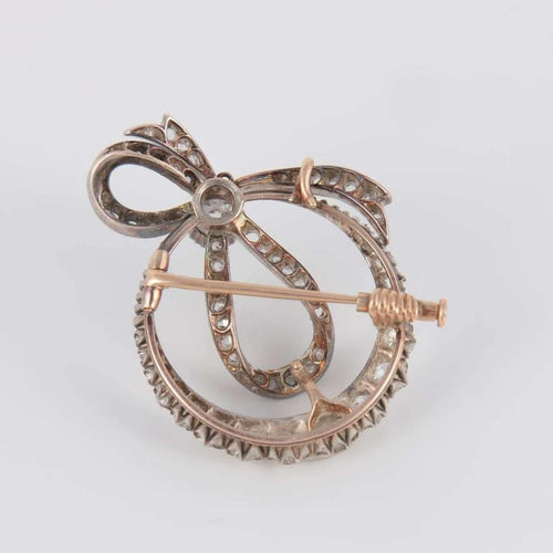 Broche Broche nœud - Diamants en or jaune et or blanc 18 ct 58 Facettes 1