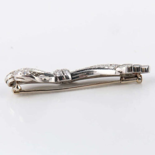 Broche Broche nœud en platine et diamants 58 Facettes 1