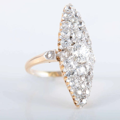 Bague 44 Bague marquise en or jaune 750 ornée de diamants 58 Facettes 220396
