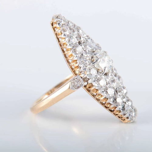 Bague 44 Bague marquise en or jaune 750 ornée de diamants 58 Facettes 220396