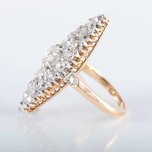 Bague 44 Bague marquise en or jaune 750 ornée de diamants 58 Facettes 220396