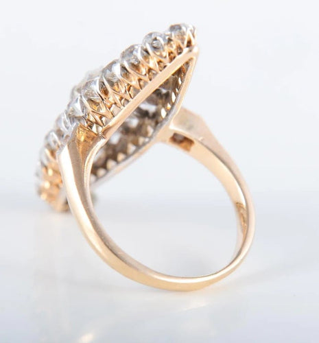 Bague 44 Bague marquise en or jaune 750 ornée de diamants 58 Facettes 220396