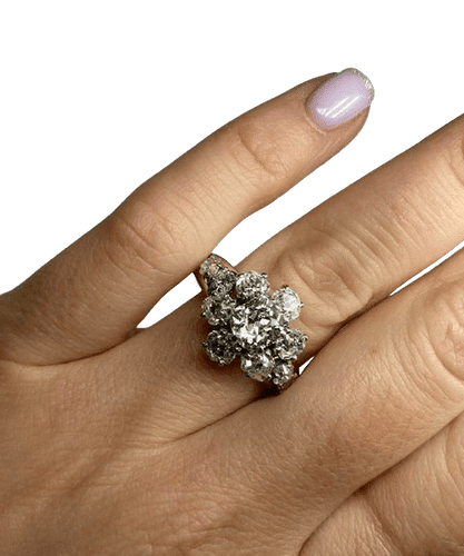 Bague 62 Bague marguerite en platine et diamants 58 Facettes