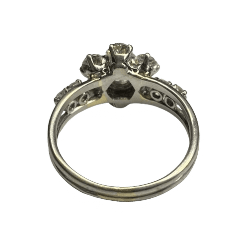 Bague 62 Bague marguerite en platine et diamants 58 Facettes