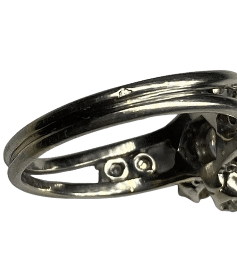Bague 62 Bague marguerite en platine et diamants 58 Facettes