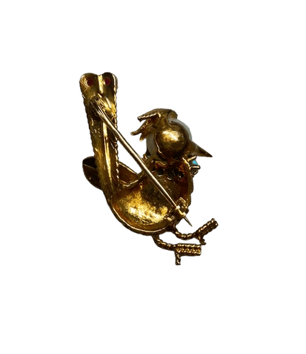 Broche Broche oiseau en or jaune 18K, perle, turquoises et rubis 58 Facettes 240470