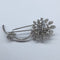 Broche Broche motif floral en platine et diamants 58 Facettes 250194