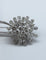 Broche Broche motif floral en platine et diamants 58 Facettes 250194