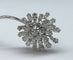 Broche Broche motif floral en platine et diamants 58 Facettes 250194
