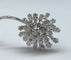 Broche Broche motif floral en platine et diamants 58 Facettes 250194