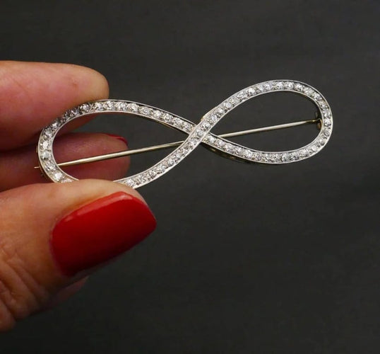 Broche Broche Art déco en or blanc et platine sertie de diamants 58 Facettes B38-03