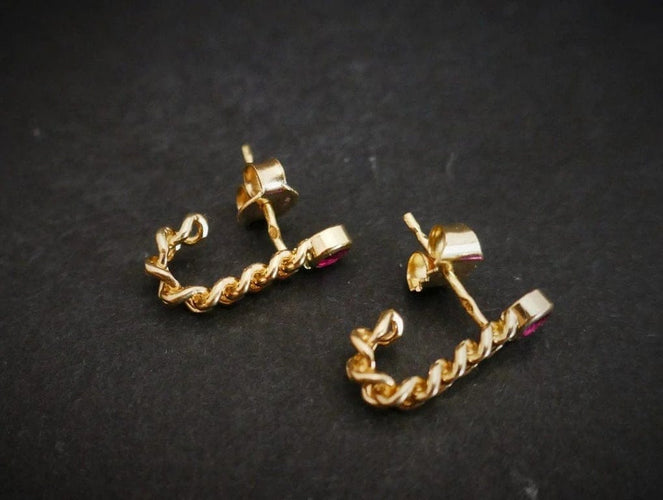 Boucles d'oreilles Boucles d'oreilles rubis en or jaune 18 carats 58 Facettes 848925