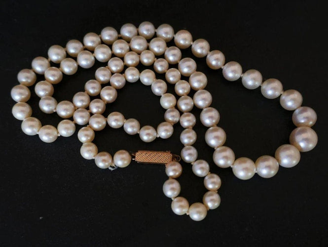 Collier Collier de perles de culture avec fermoir en or jaune 18 carats 58 Facettes 817136