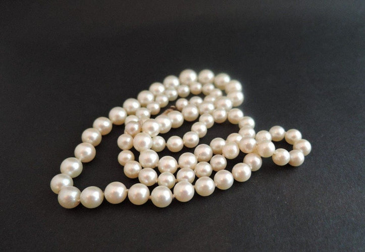 Collier Collier de perles de culture avec fermoir en or jaune 18 carats 58 Facettes 817136