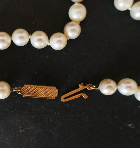 Collier Collier de perles de culture avec fermoir en or jaune 18 carats 58 Facettes 817136