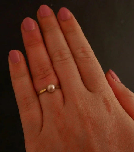 Bague 50 Bague en or jaune 18 carats sertie d’une perle de culture 58 Facettes