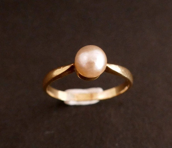 Bague 50 Bague en or jaune 18 carats sertie d’une perle de culture 58 Facettes