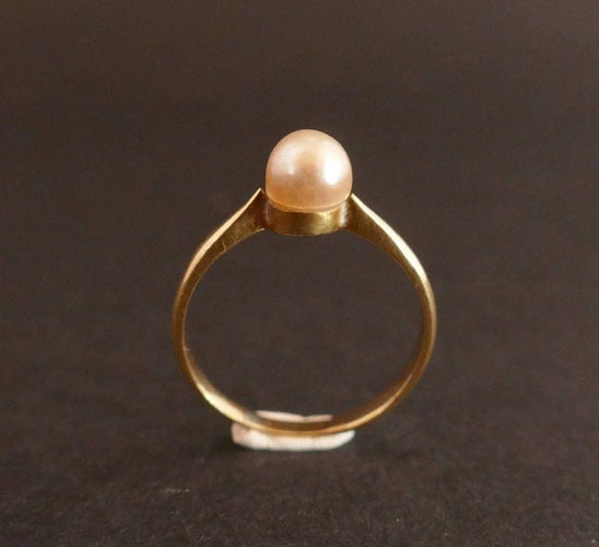 Bague 50 Bague en or jaune 18 carats sertie d’une perle de culture 58 Facettes