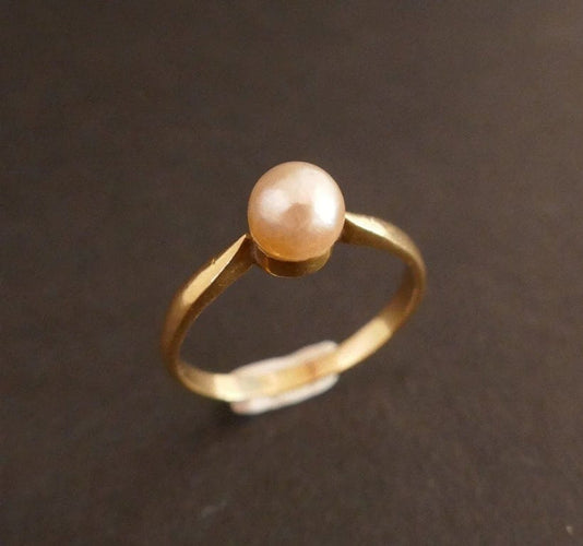 Bague 50 Bague en or jaune 18 carats sertie d’une perle de culture 58 Facettes