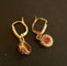 Boucles d'oreilles Boucles d’oreilles dormeuses en or jaune 18 carats, perles et pierre rouge 58 Facettes 1043291