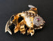 Broche Broche poisson rubis et diamants en platine et or jaune 18 carats 58 Facettes 1026794