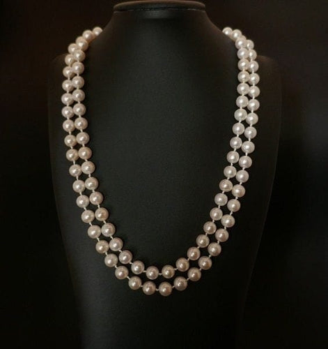 Collier Sautoir de perles de culture avec fermoir en or jaune 18 carats 58 Facettes 1008824